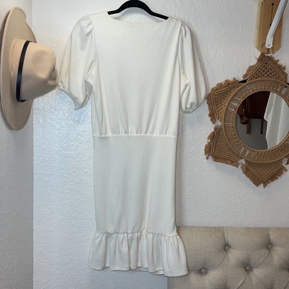 PO: Women’s White Ruffle bottom dress. - Picture 4 of 4